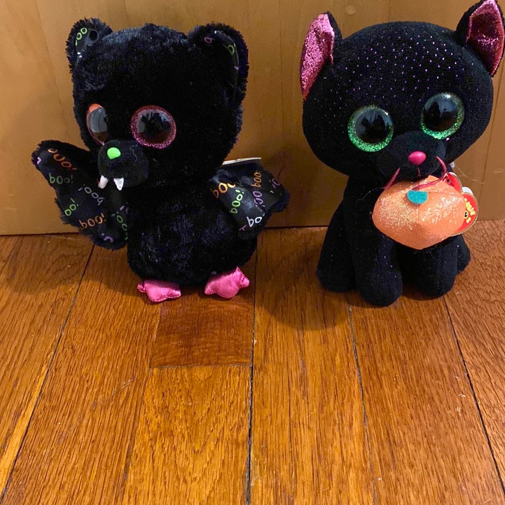 Potion the Cat and Dart the Bat